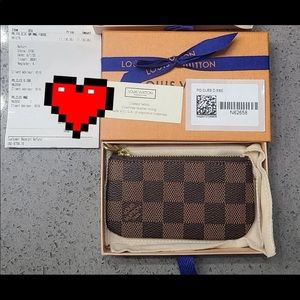 Brand new Louis vuitton key pochette